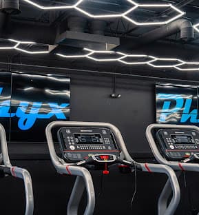 Cardio equipment at the Phyx Performance Orchard Lake facility